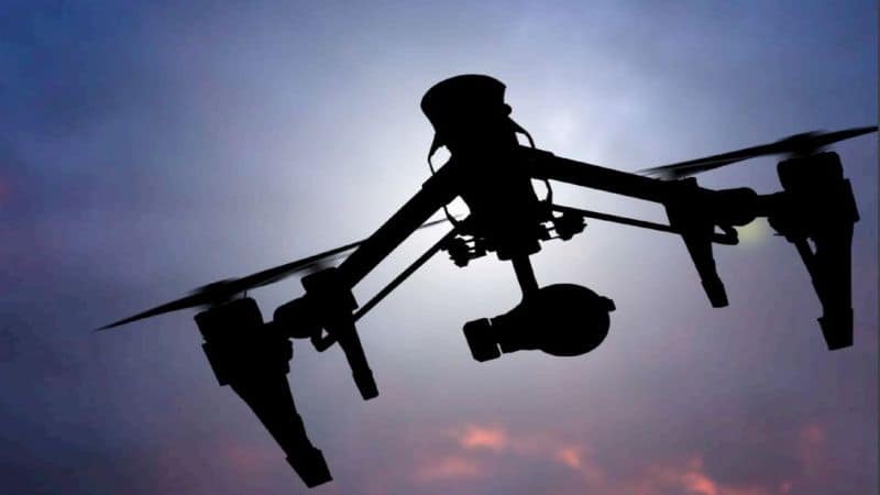 Drone hovering in the sky indicating a share price gain in drone technology Xtek share price profit result