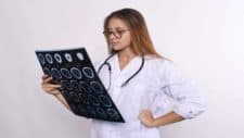 woman doctor with MRI scans