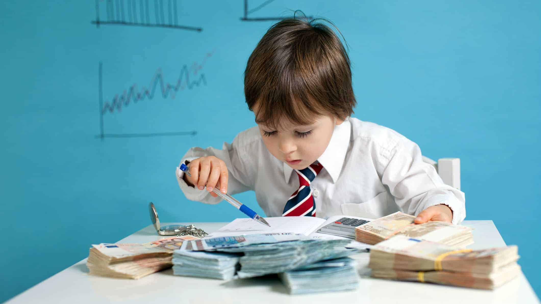 First time buyer of shares represented by child in suit reading asx share price charts