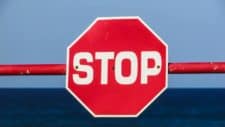 A red stop sign, indicating an ASX share or company is in a trading halt