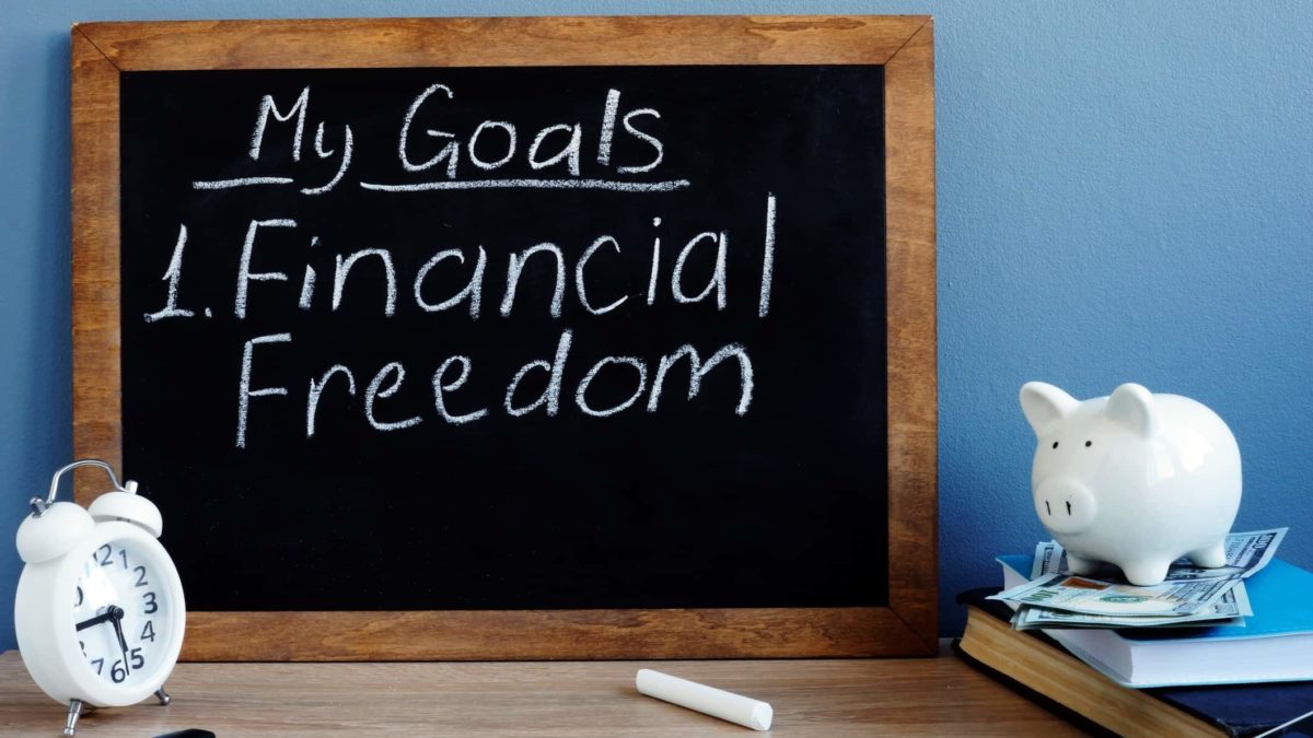 chalkboard with financial freedom goal