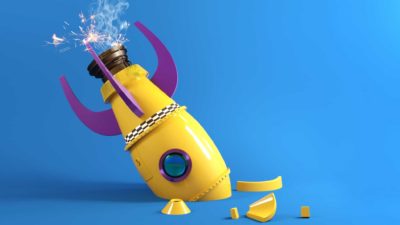 falling asx share price represented by toy rocket crashed into ground