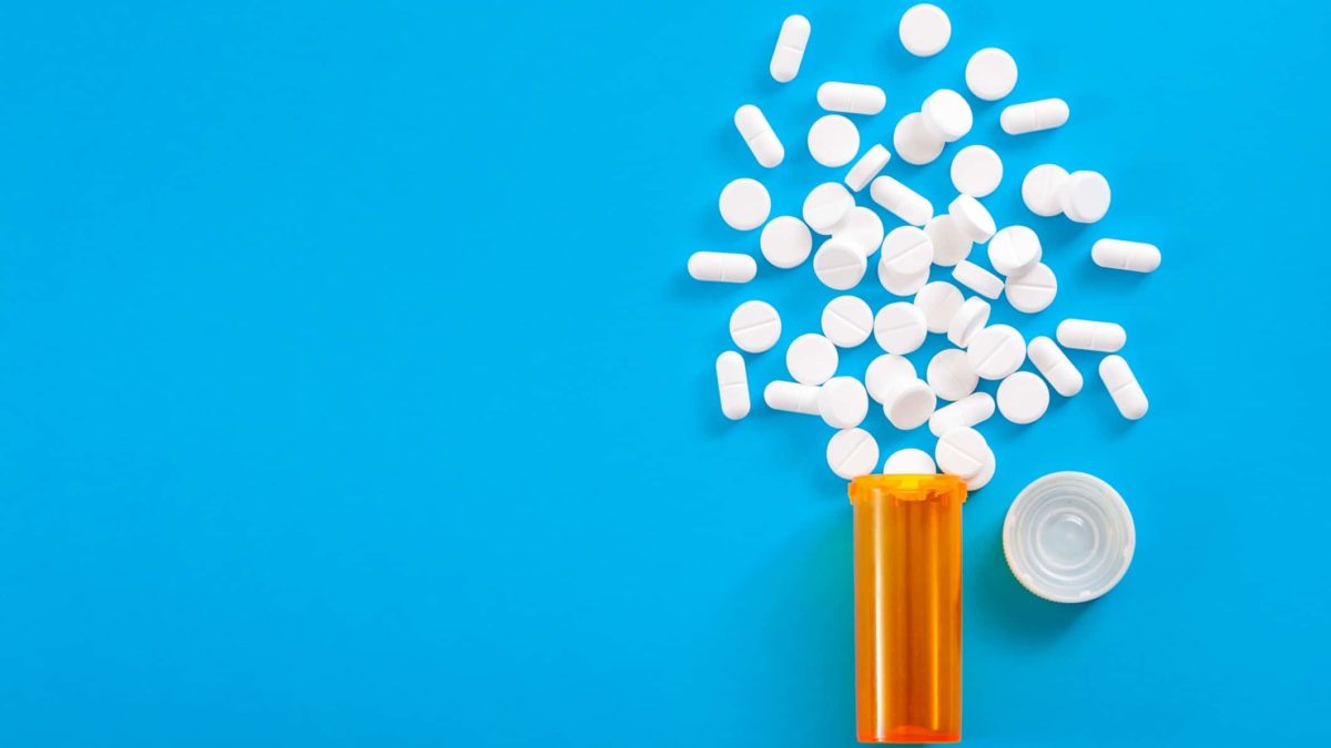 pills spilling from bottle