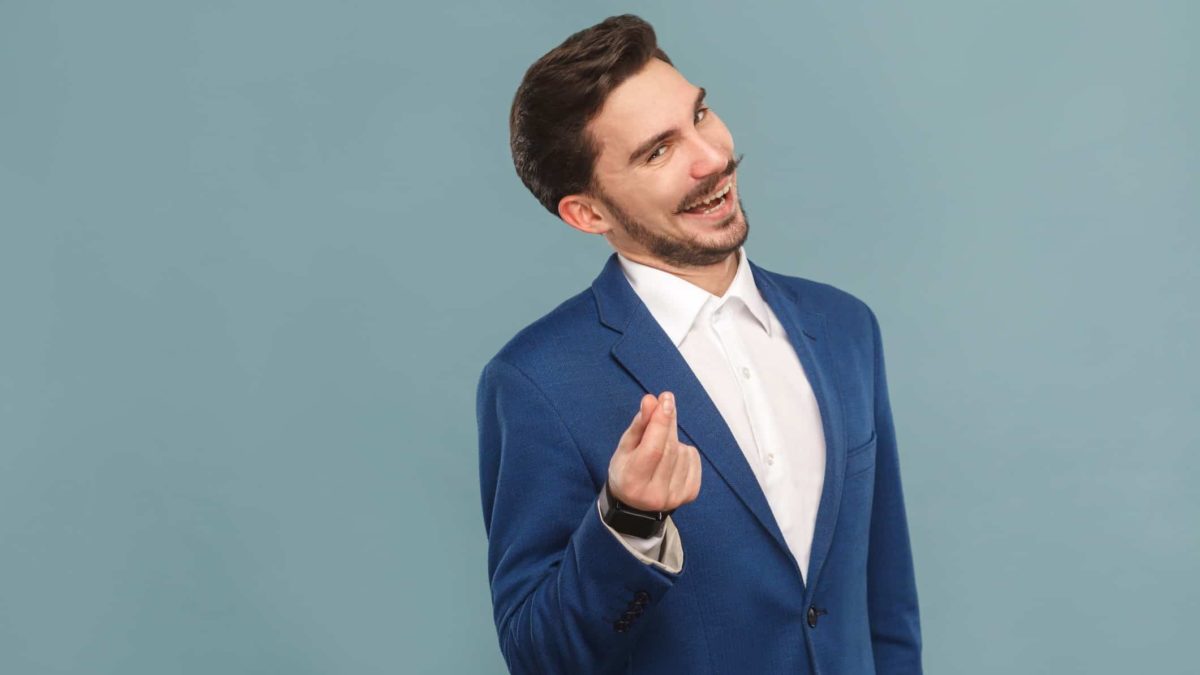 Sleazy businessman gesturing for money