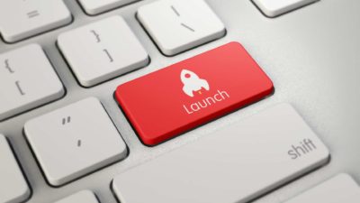 Increasing ASX share price represented by red launch button with rocket symbol on keyboard