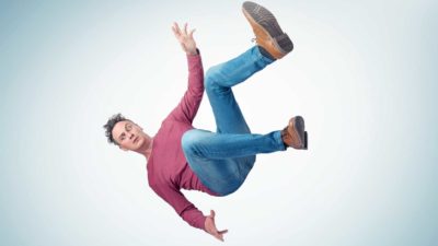 Falling ASX share price represented by man falling through the air.