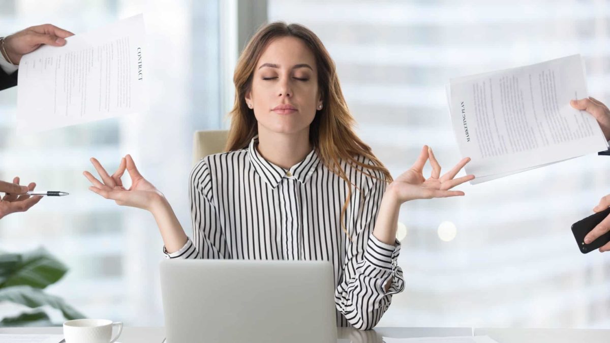 woman meditating and keeping calm