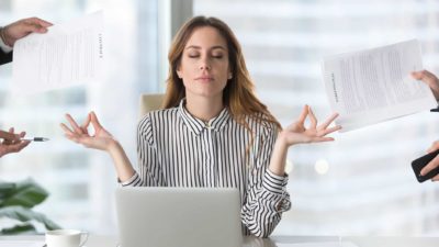 woman meditating and keeping calm