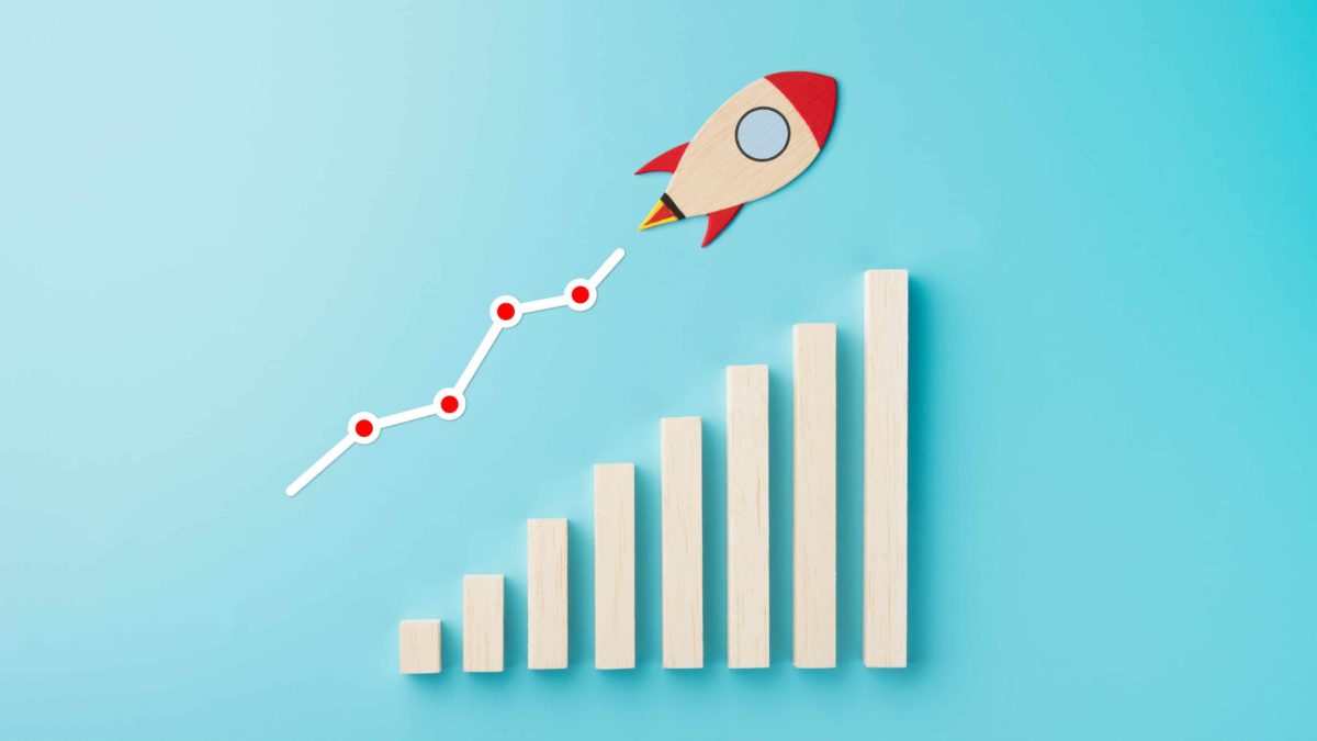 asx share price growth represented by rocket flying up increasing bar chart.