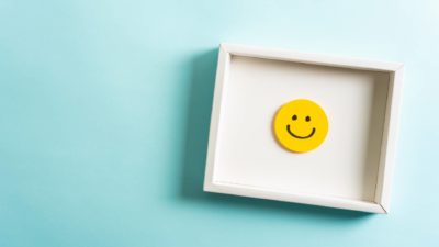 A smiley face on the wall, indicating a share price lift on the ASX