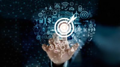 hand reaching out to bullseye target, invest in shares, asx 200 shares