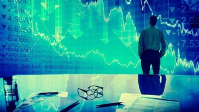 Investor looking at share market chart