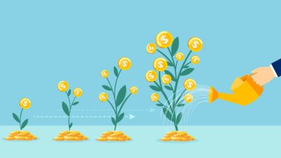 watering can watering money trees which are growing in size