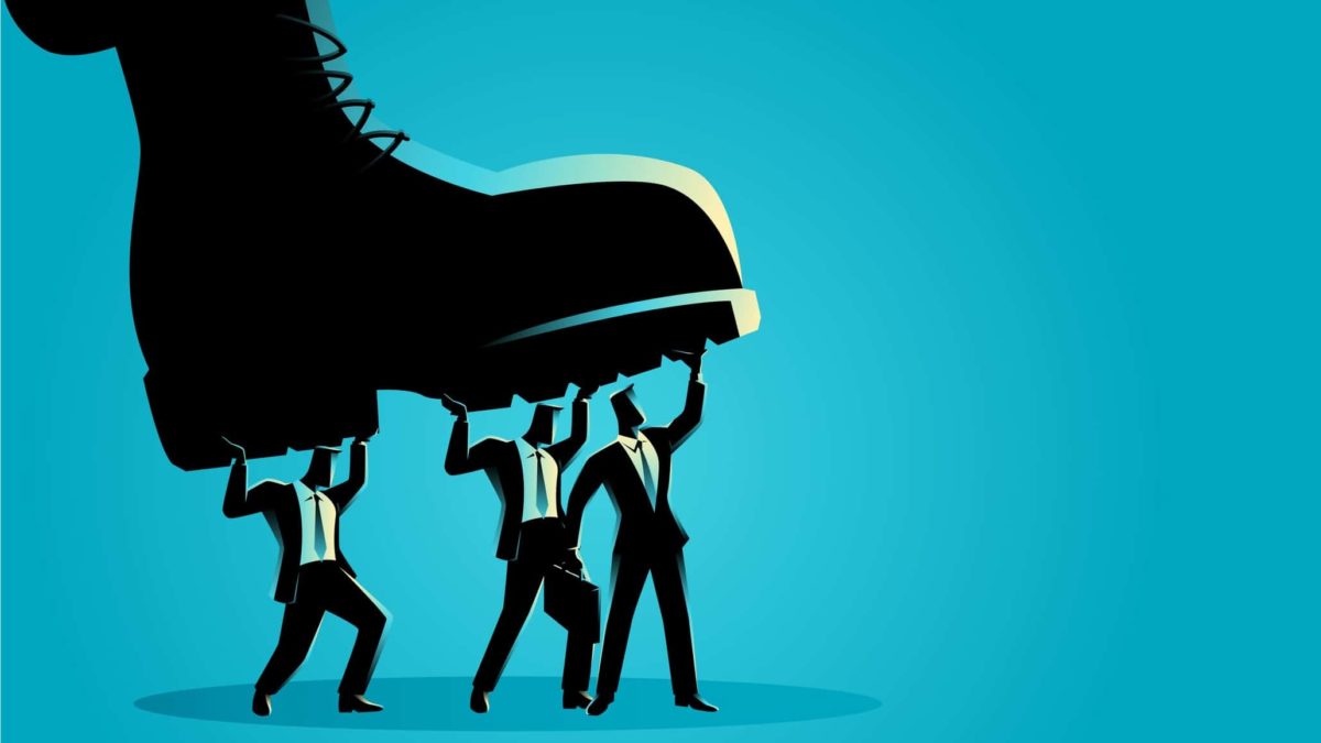 AMP share price fall represented by illustration of large boot almost trampling three businessmen