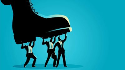 AMP share price fall represented by illustration of large boot almost trampling three businessmen