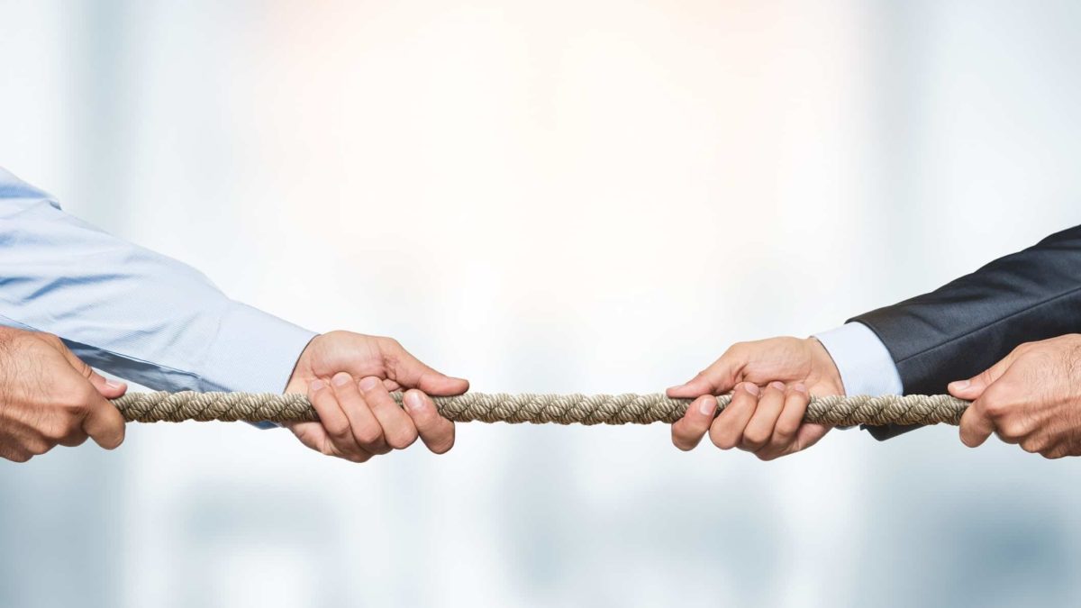 asx shares represented by business men engaged in tug of war
