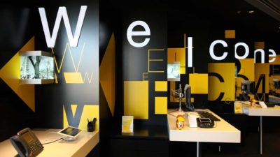 CBA share price represented by branch welcome sign