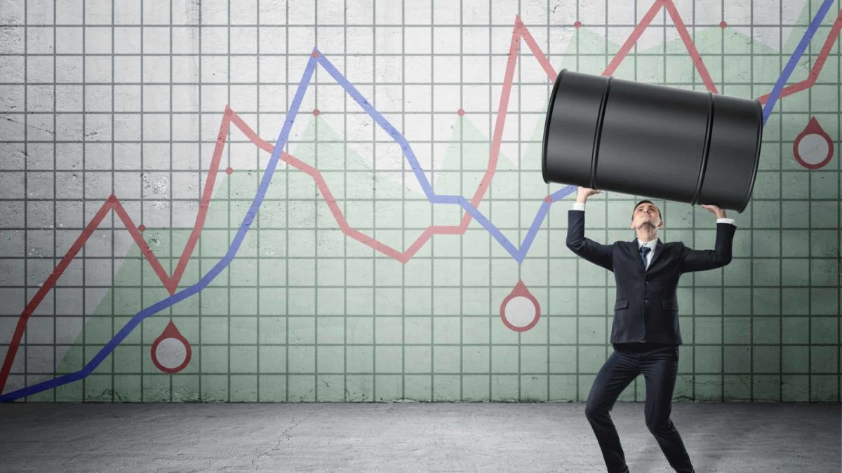 ASX oil shares recovery man holding up barrel of oil against rising chart representing rising oil search share price