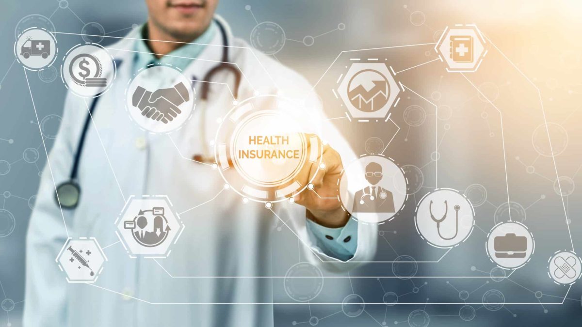 ASX share price movement represented by doctor pressing digitised screen with array of icons including one entitled health insurance