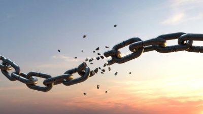 Broken chain in front of sunset