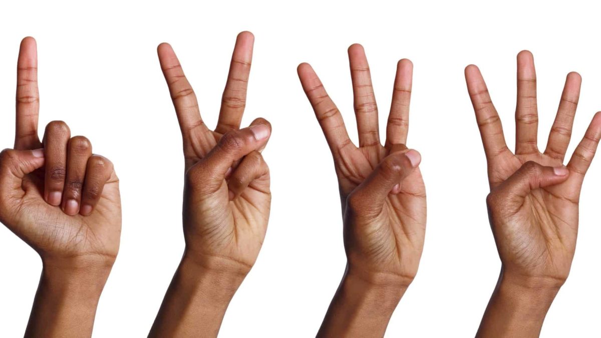 four hands making numbers one through four representing 4 asx shares to buy