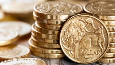 pile of one dollar coins representing asx small cap stocks