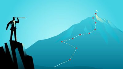 Illustration of man on mountain looking through binoculars at taller mountain in distance