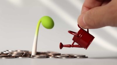 surge in asx growth share price represented by tiny bean stalk being watered by miniature watering can