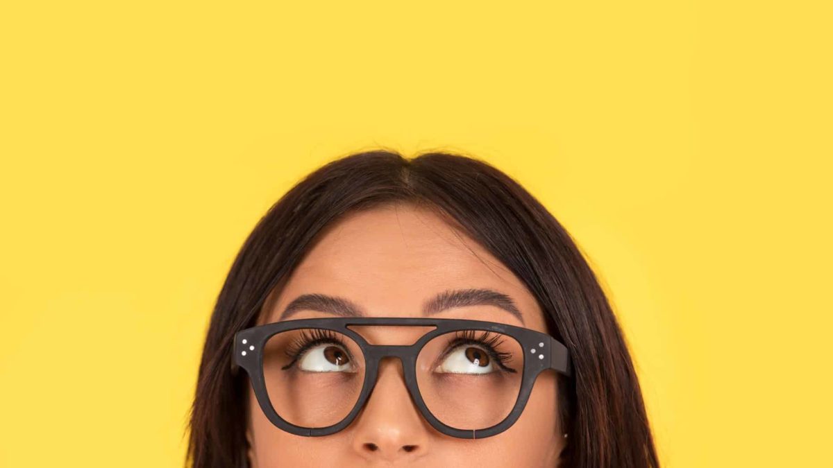 woman looking up as if watching asx share price