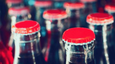 Rows of Coca-Cola bottles