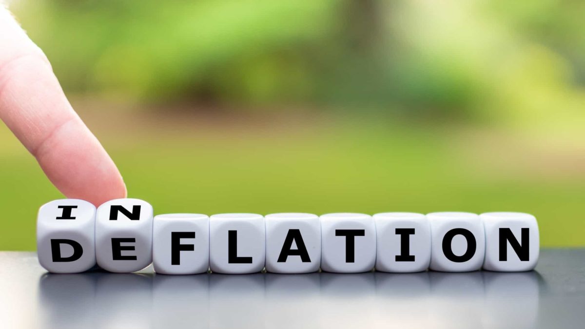 Effect of inflation on asx shares represented by finger pointing to letter blocks spelling the word inflation