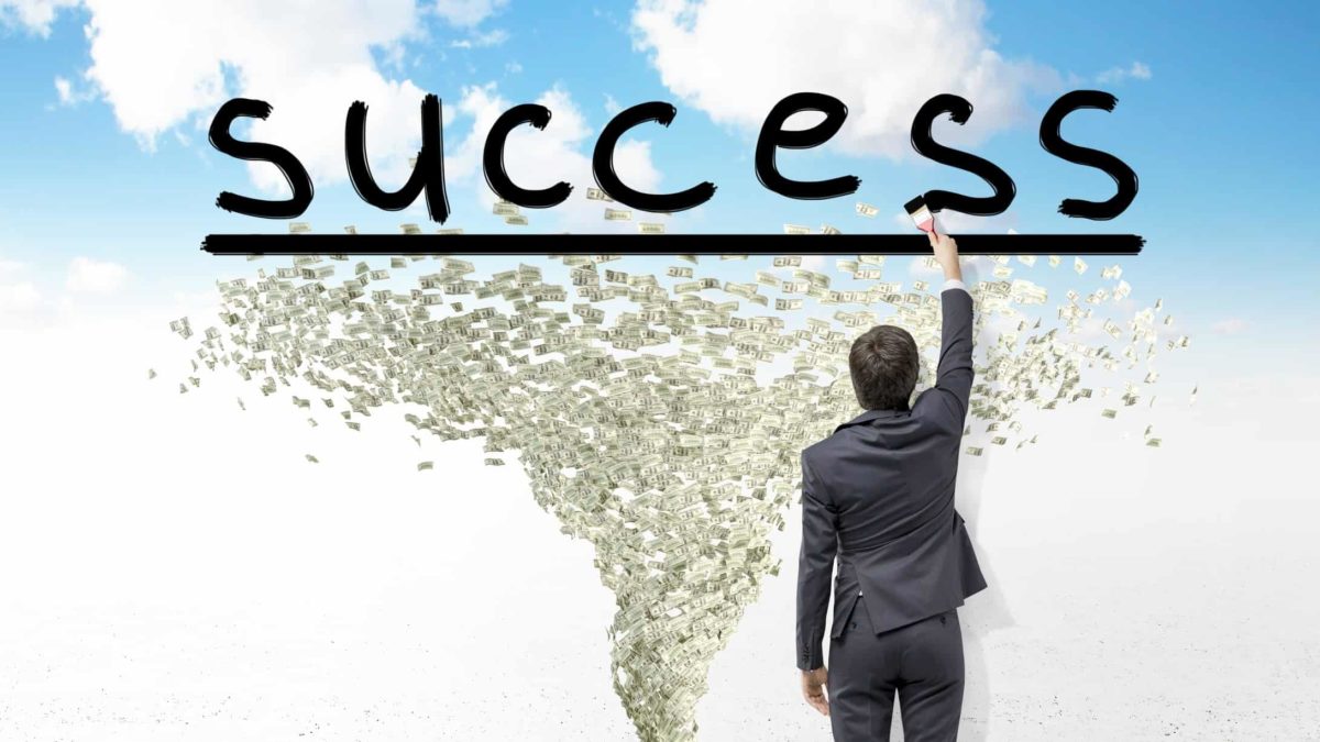 preparing for stock market crash represented by man writing success over an image of a money tornado