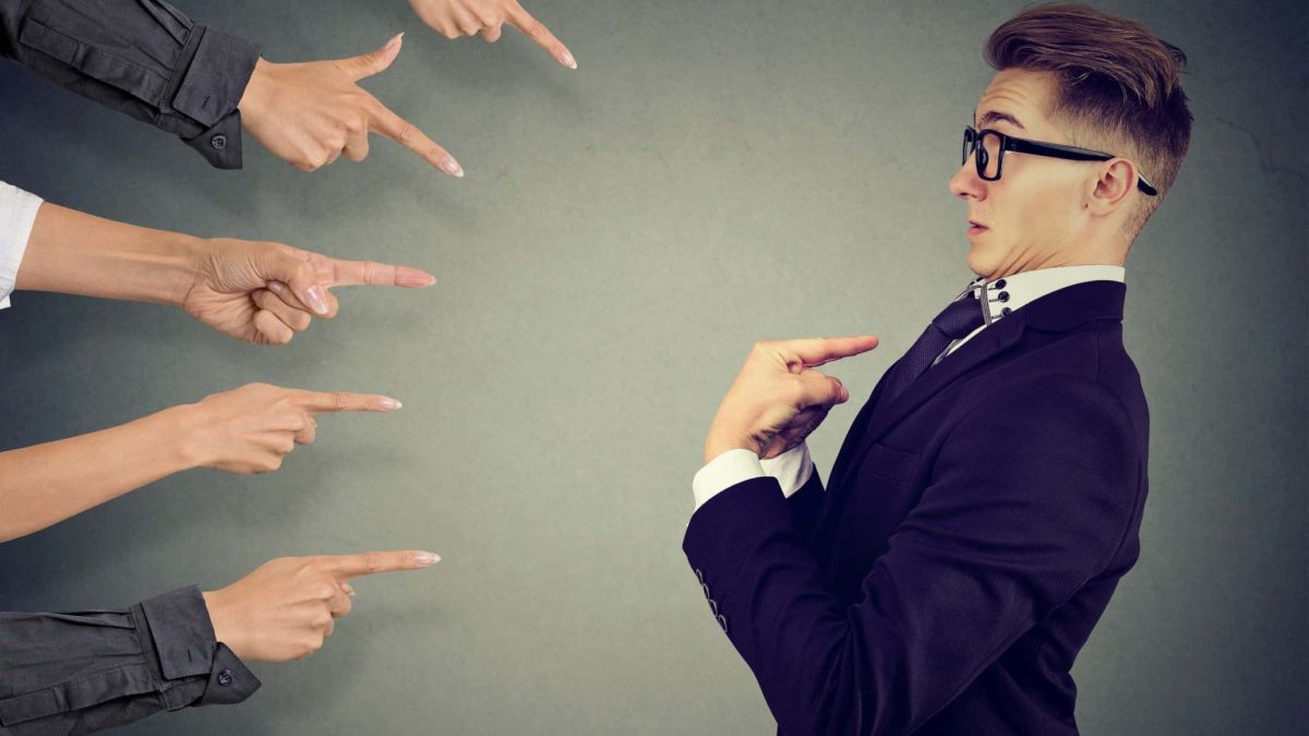 asx company executive with multiple fingers all pointing at him