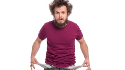 Falling asx share price represented by disgruntled man turning out empty pockets