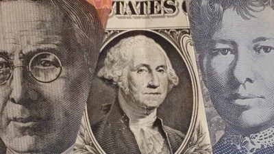 us stocks and asx share price represented by australian and us currency notes