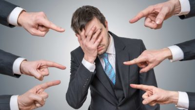 asx share penalty represented by lots of fingers pointing at disgraced businessman Crown royal commission WA