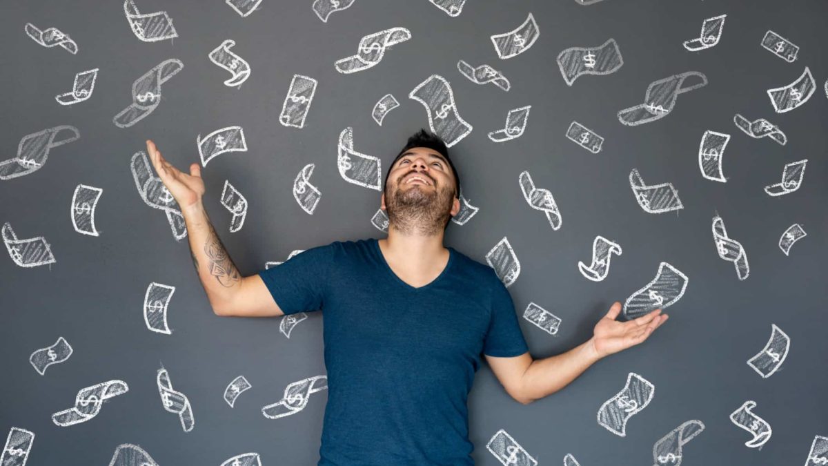 rising asx share price represented by man with arms raised against blackboard featuring images of dollar notes