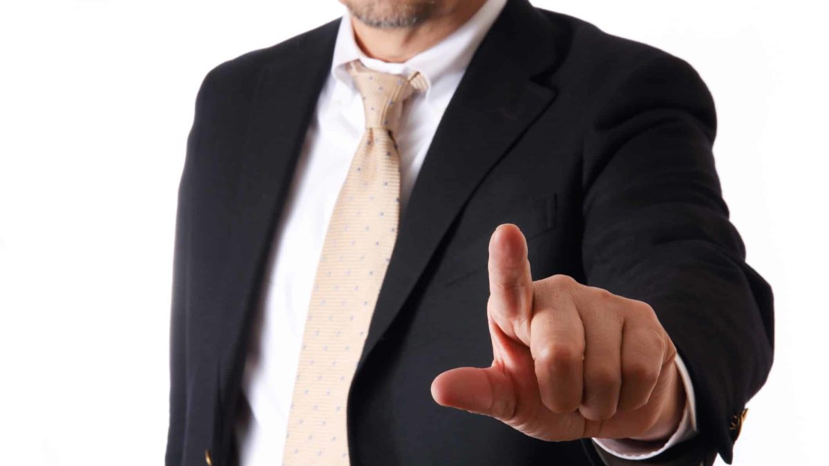 trouble with asx share represented by business man pointing finger