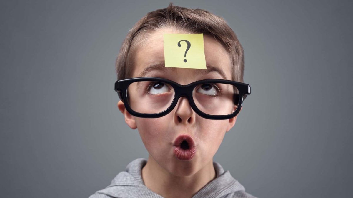 A boy with question mark on his forehead looking up as if watching an ASX share price