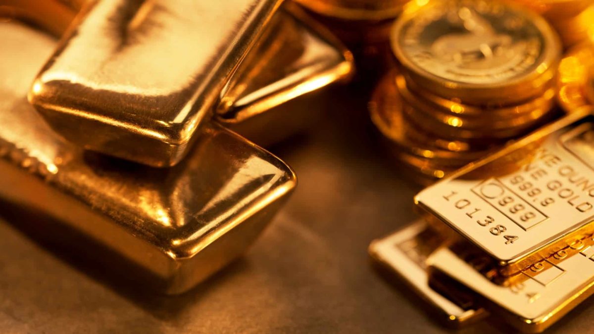 Block of solid Gold and gold coins