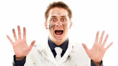 asx share price exploding represented by excited looking scientist