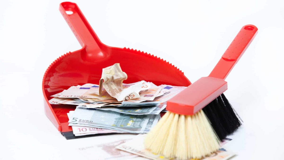 falling waste ASX share price represented by broom sweeping cash into dust pan