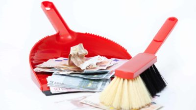 falling waste ASX share price represented by broom sweeping cash into dust pan