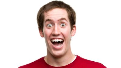 rising asx share price represented by investor with look of happy surprise