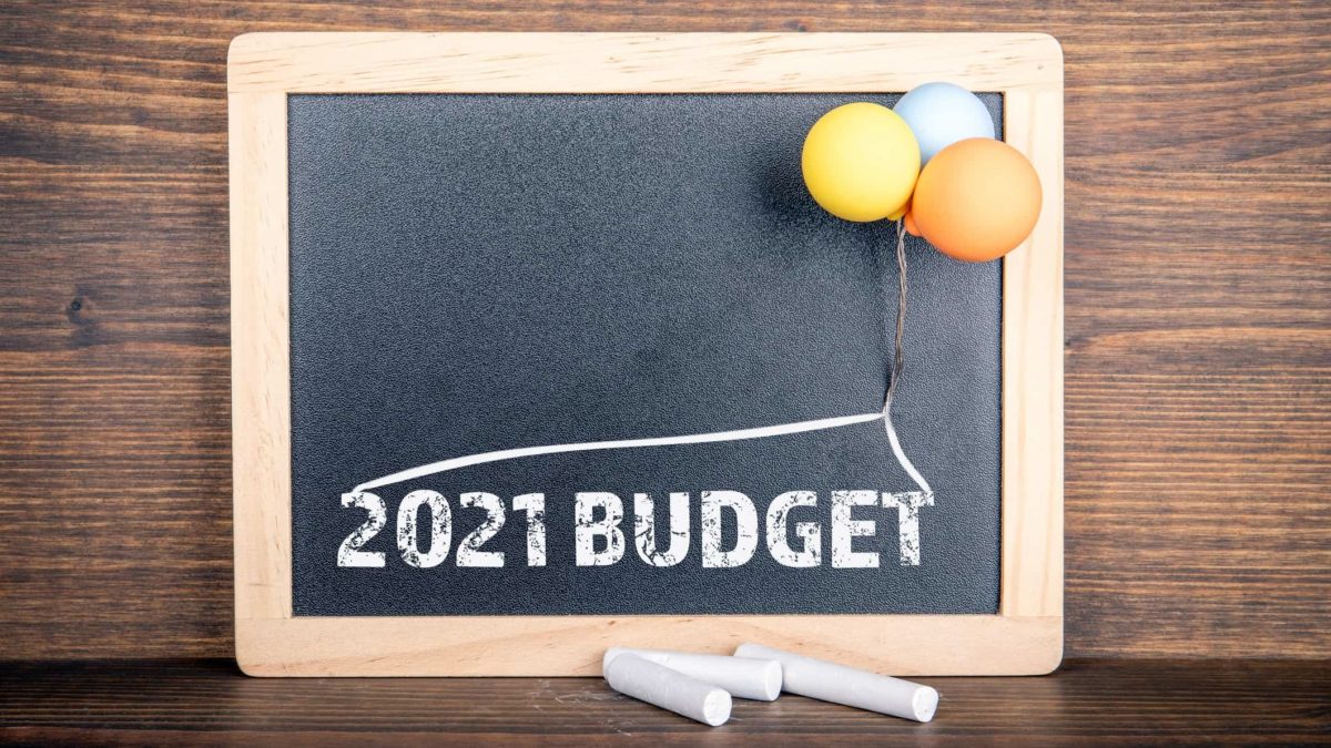 ASX shares Victorian state 2021 Budget written on chalkboard with colourful balloons