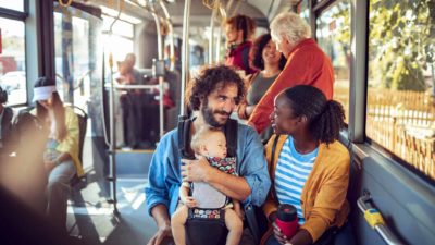 Family travelling on a bus