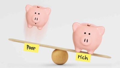 rising asx share price represented by 2 piggy banks on seesaw with tags saying rich and poor