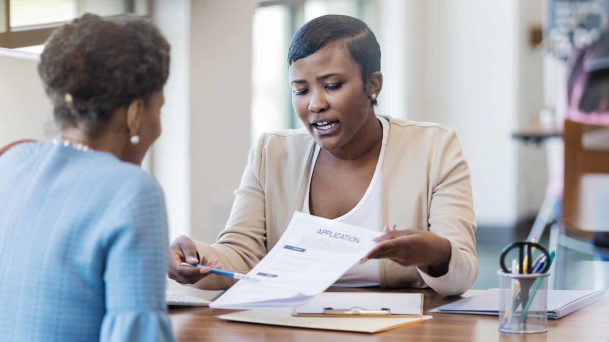woman explaining finances to a customer