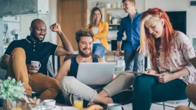 millennials hanging out with each other on their gadgets