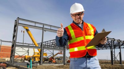 thumbs up from a construction worker in a construction site